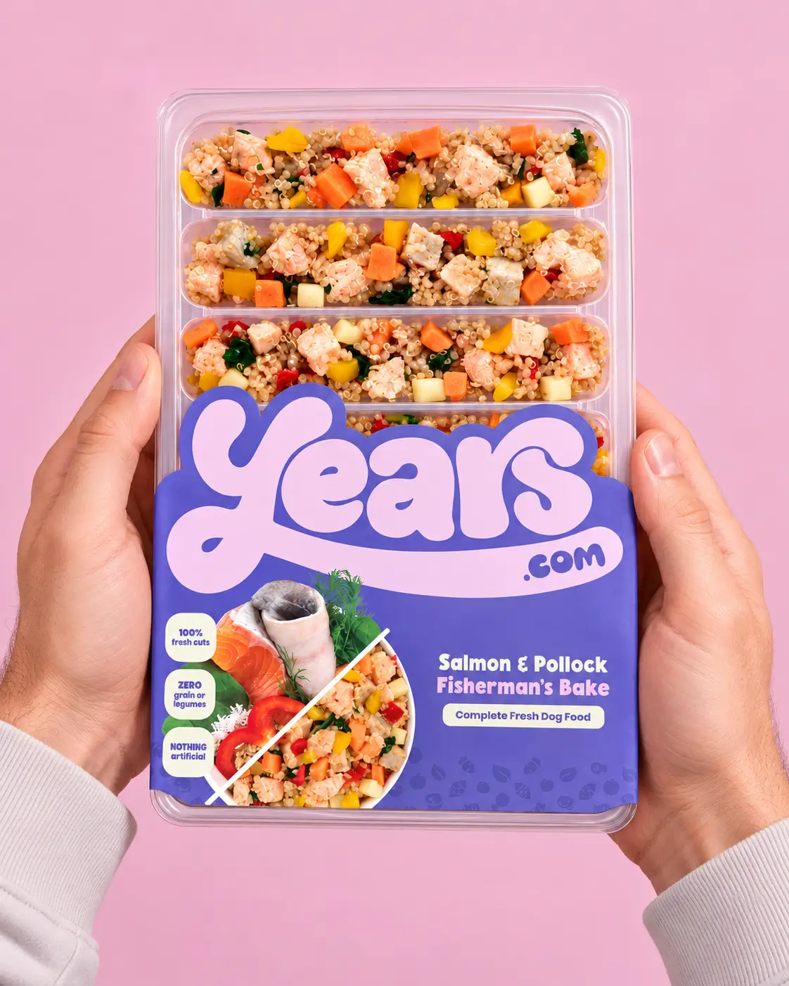 Years.com Salmon and pollock tray packaging held in hand